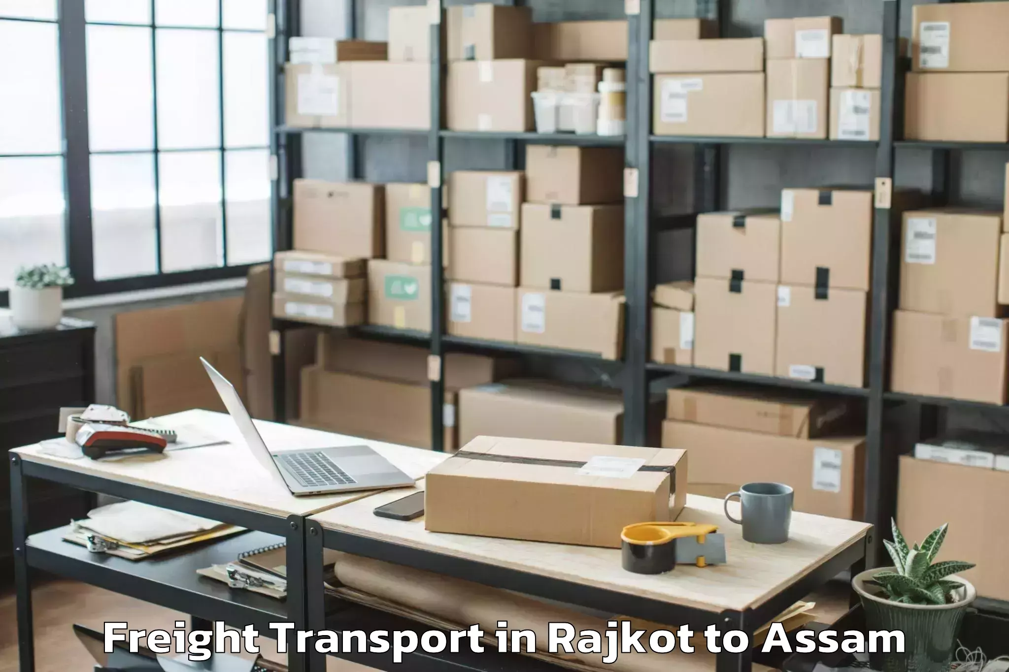 Book Rajkot to Bogribari Freight Transport Online